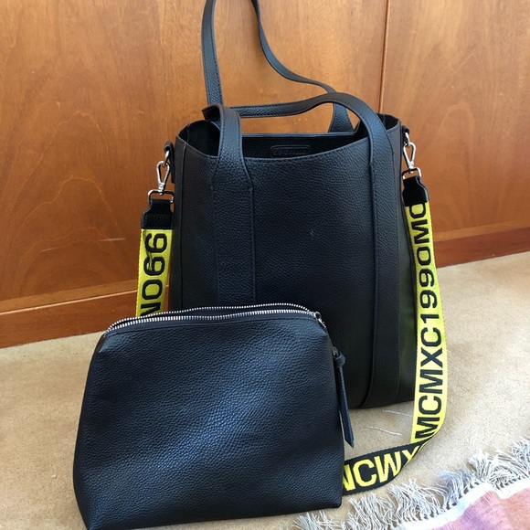 black bag with yellow strap